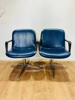 2 Office Chairs Attr. In Strafor, White Molded Plastic Shell, Blue Leatherette And Chrome Metal Star Base